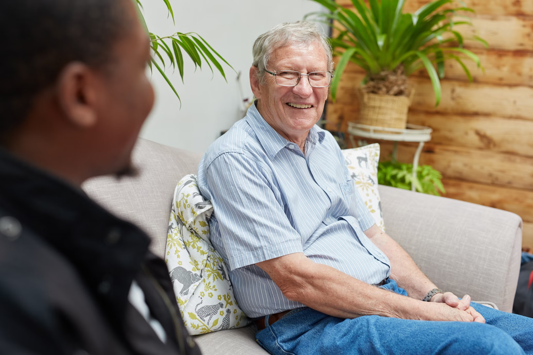 Home care nurse monitoring progress of stroke recovery with patient