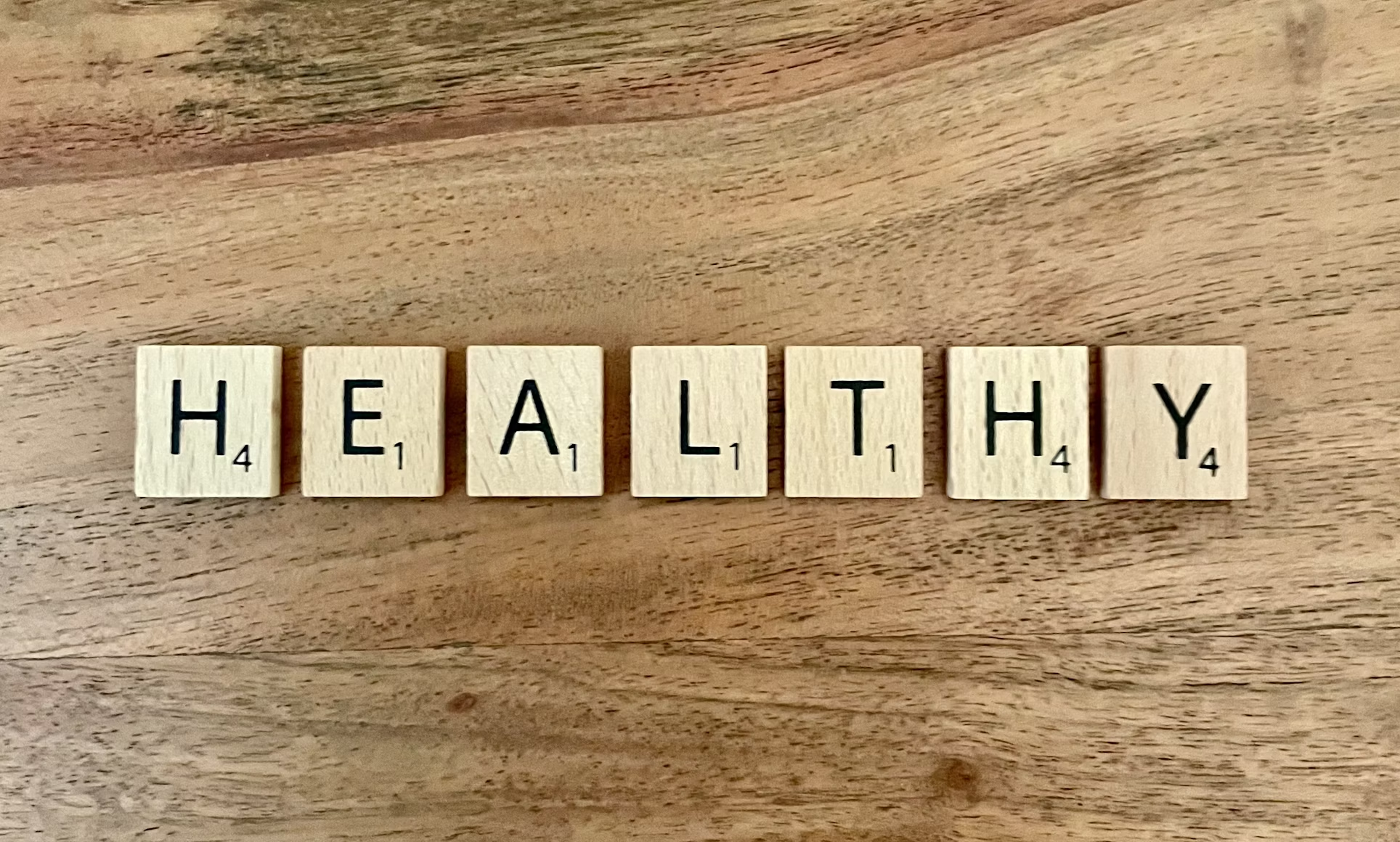 The word "Healthy" written in bold letters, symbolizing wellness and a healthy lifestyle.