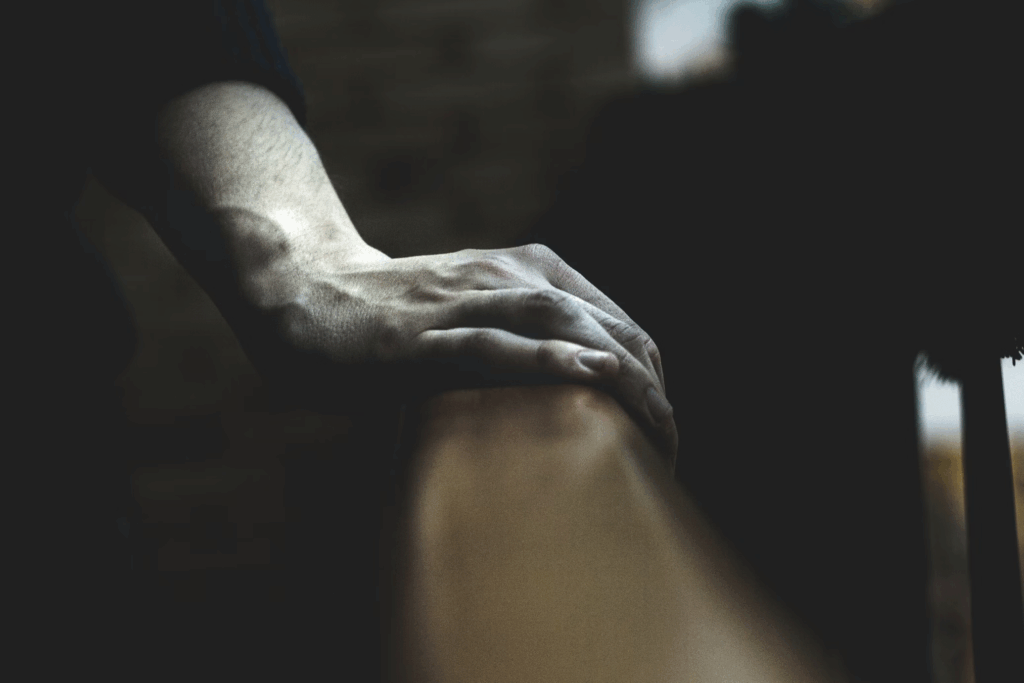 Professional caregiver assisting stroke patient with daily routines at home