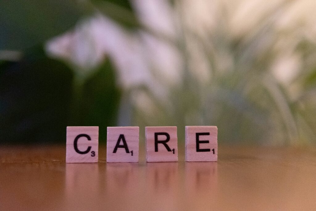 Caregiver and social worker discussing disability benefits