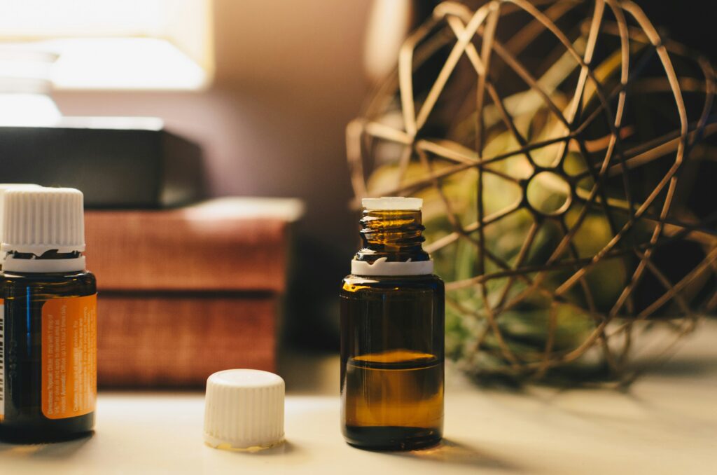 Senior applying aromatherapy oil on hand for emotional relief
