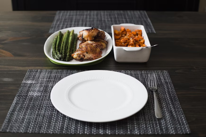 Caregiver providing meal preparation as part of non-medical in-home care services