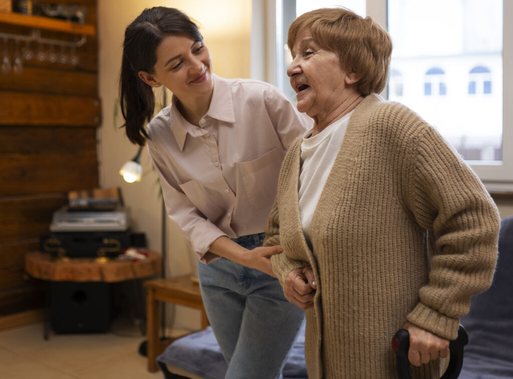 Caregiver showing patience while helping seniors