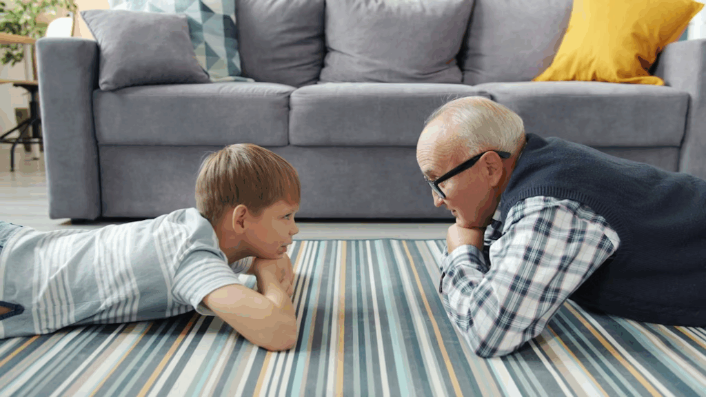 Adaptive tools and magnifiers arranged on a table for seniors with vision loss.