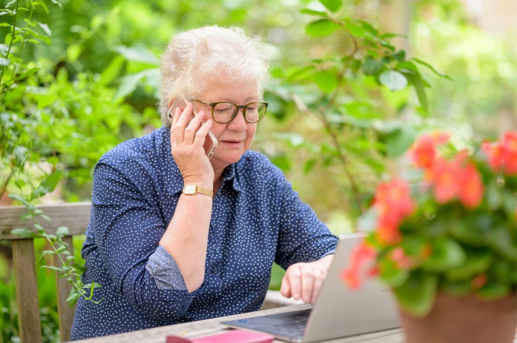 Indiana senior smiling with caregiver during in-home companionship visit