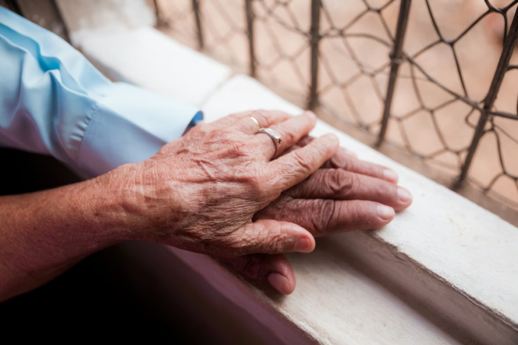 hospice nurse providing care to a patient at home