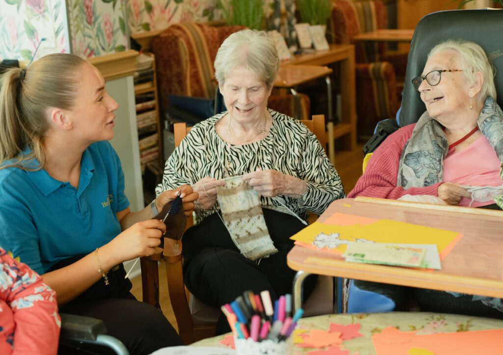 Senior woman smiling during companionship visit from Indiana senior care professional