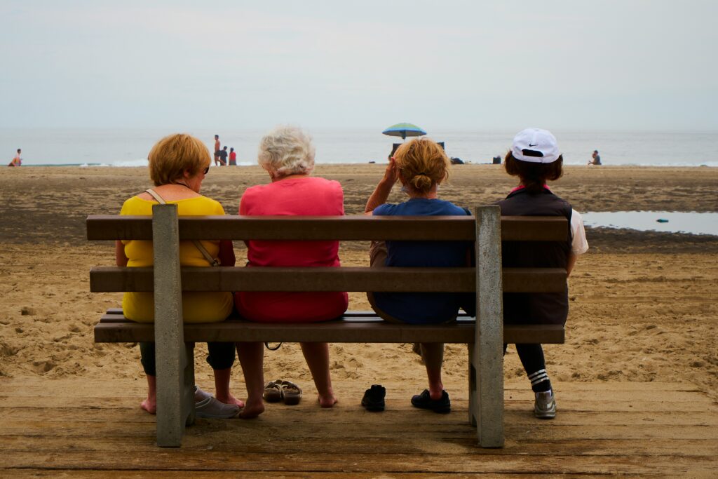 Caregiver helping senior recognize early signs of dementia through memory activities