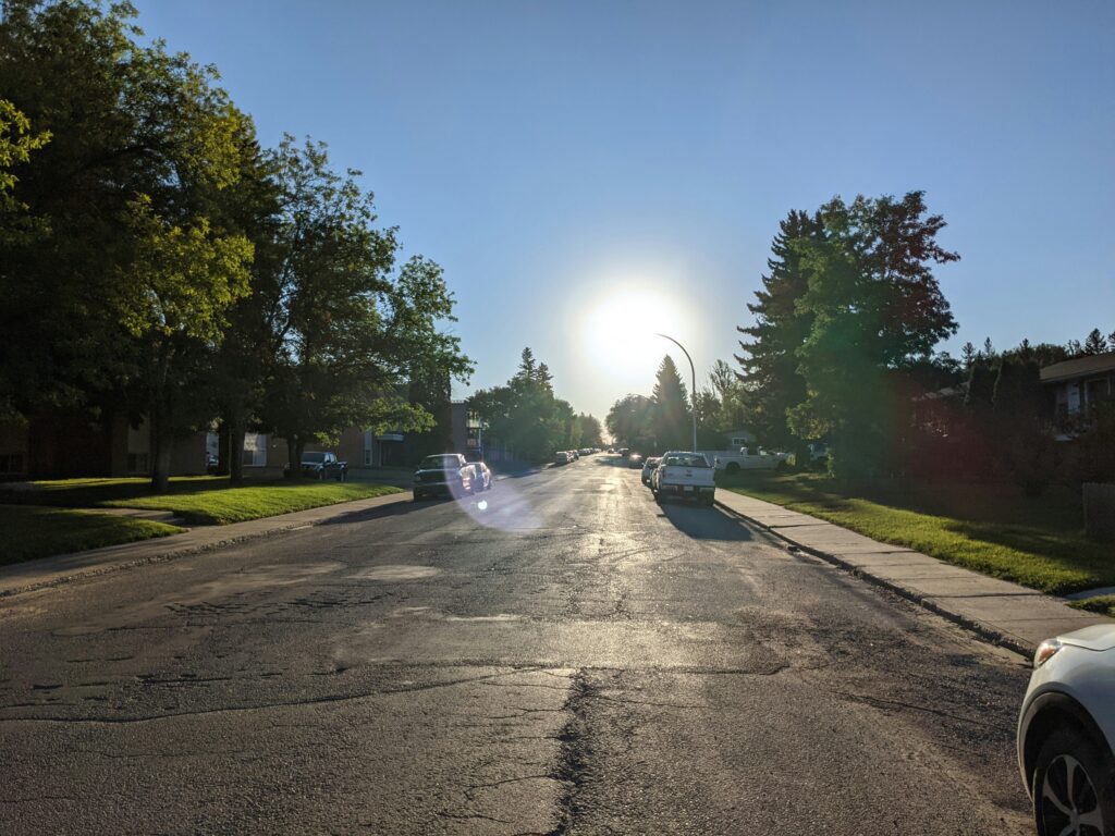 Hot summer day on an Indianapolis street, prompting seniors to seek nearby cooling centers