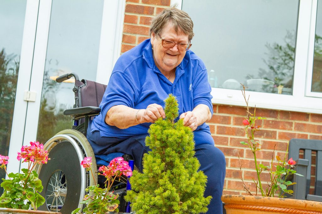 Caregiver offering reassurance to a senior during an evening routine