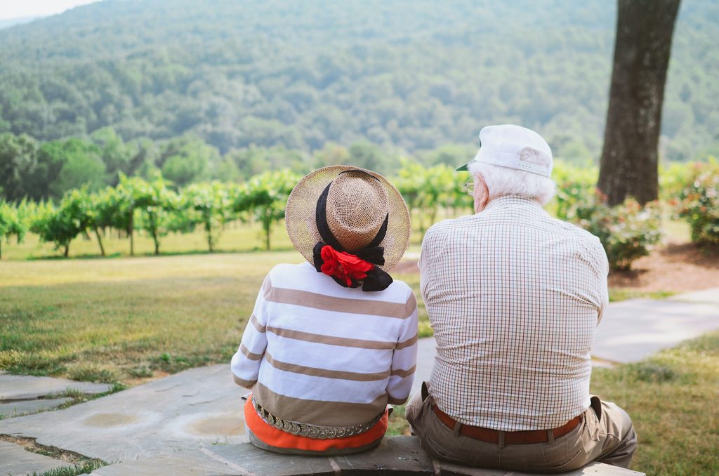 Senior man enjoying a familiar morning routine with a substitute caregiver during backup care for elderly parents